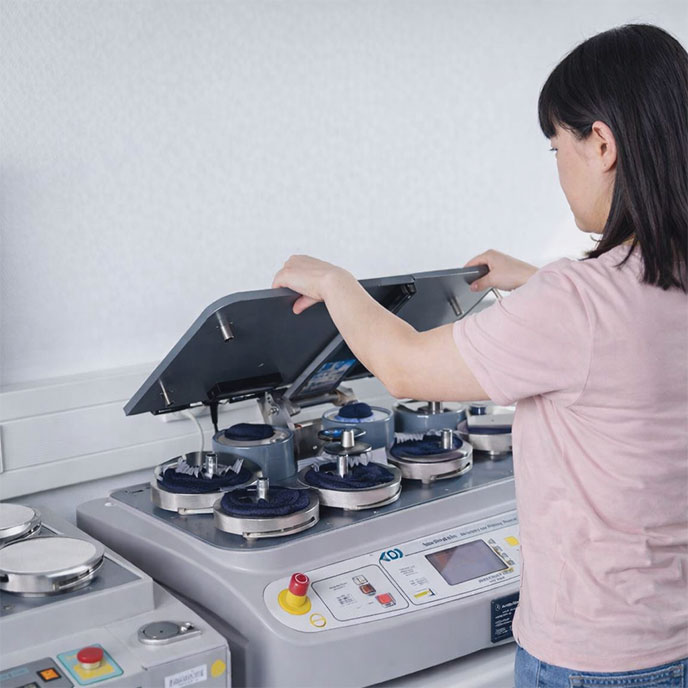 Finishing control for fabric quality control in production: testing shrinkage and hand feel consistency