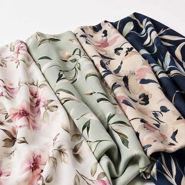 Printed crepe fabric for dresses, blouses and women’s fashion apparel, available in polyester, rayon or blended base fabrics with different print methods and surface textures.